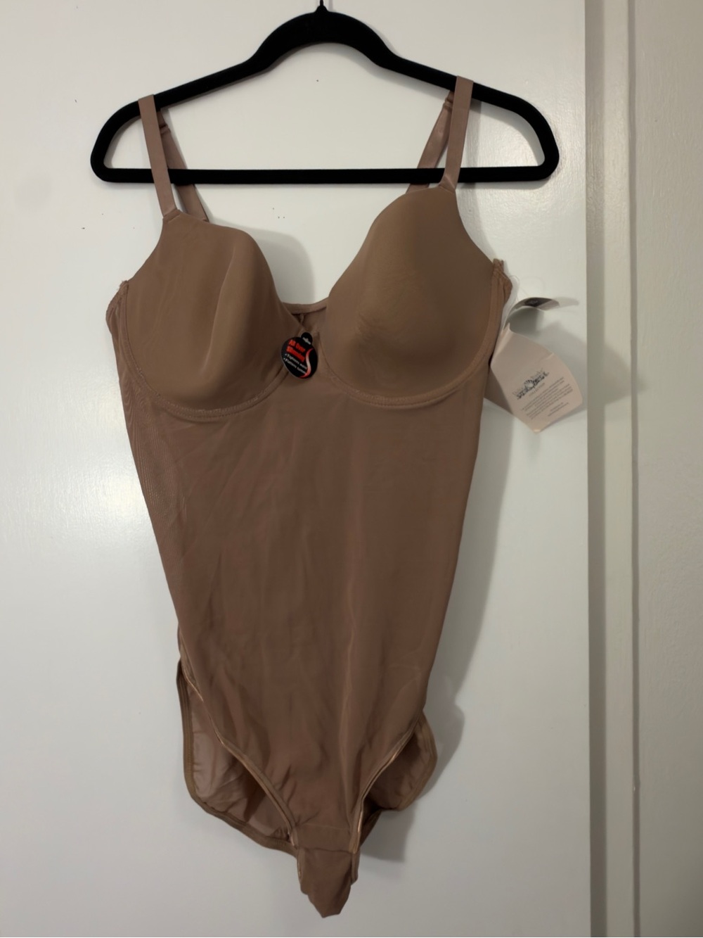 NWT Delta Burke Tan bodysuit with built in bra and adjustable straps. Size 3X.